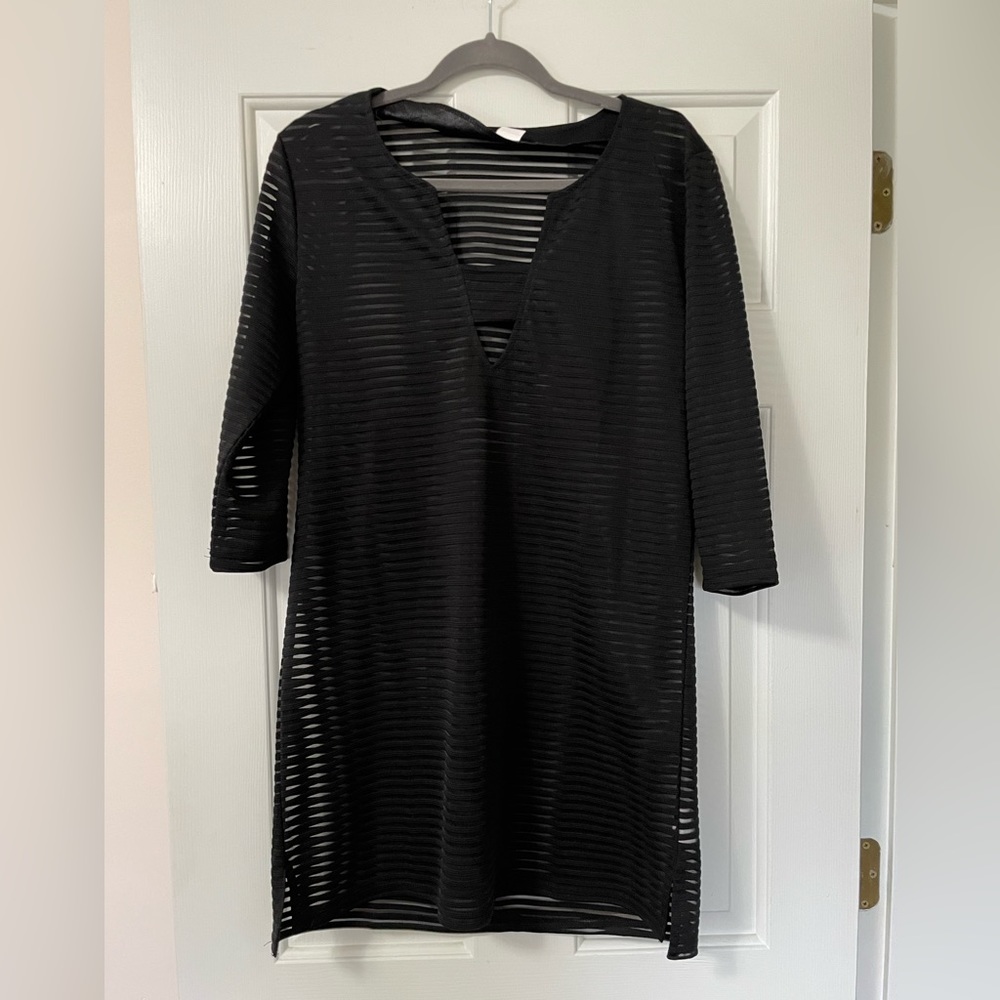 Size Medium Venus sheer long sleeved black coverup.  Never worn